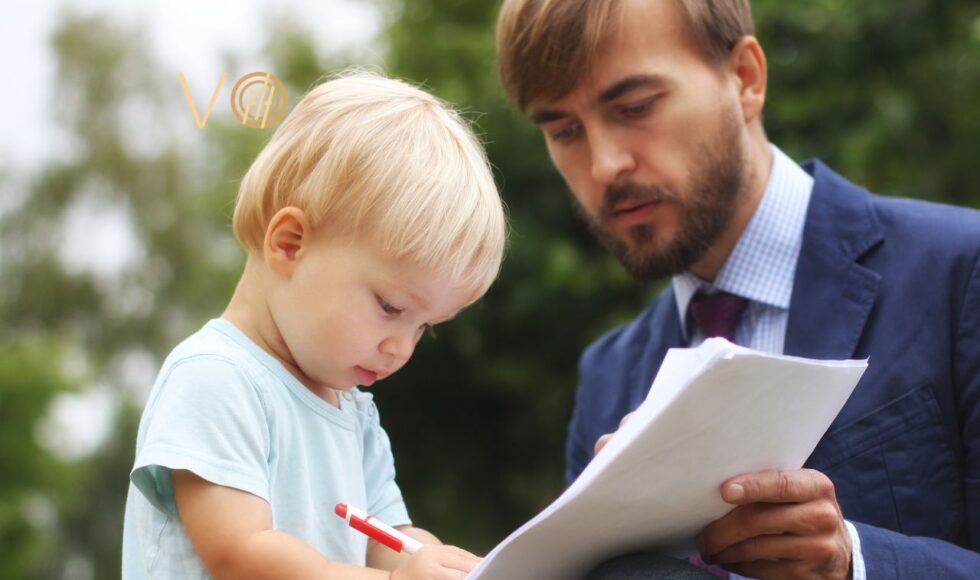 dziecko podpisuje dokument